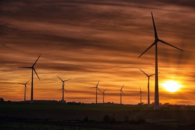 silhouette windmills field during sunset 181624 27593 1